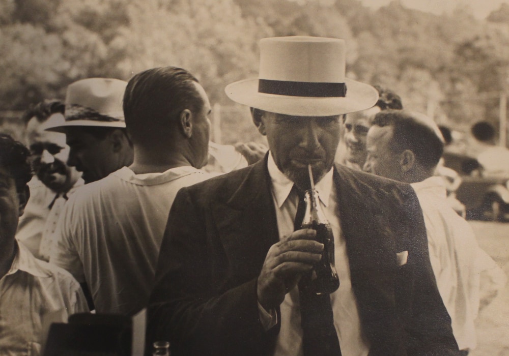 Many of Wilkins personal photographs are unexpected. Here he enjoys a Coke
